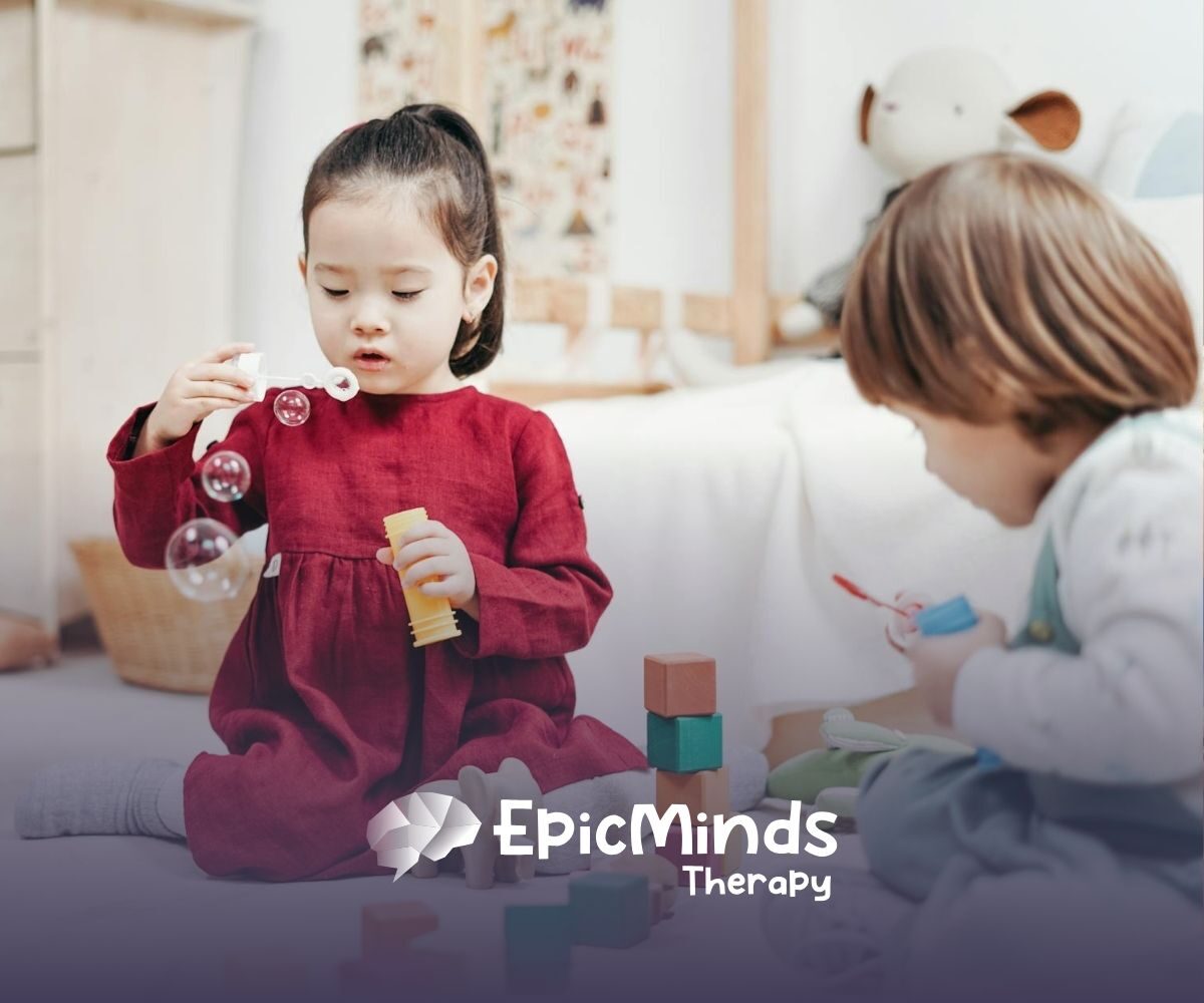 An autistic girl holding and inspecting a wooden toy helicopter at a table during ABA therapy in MD.
