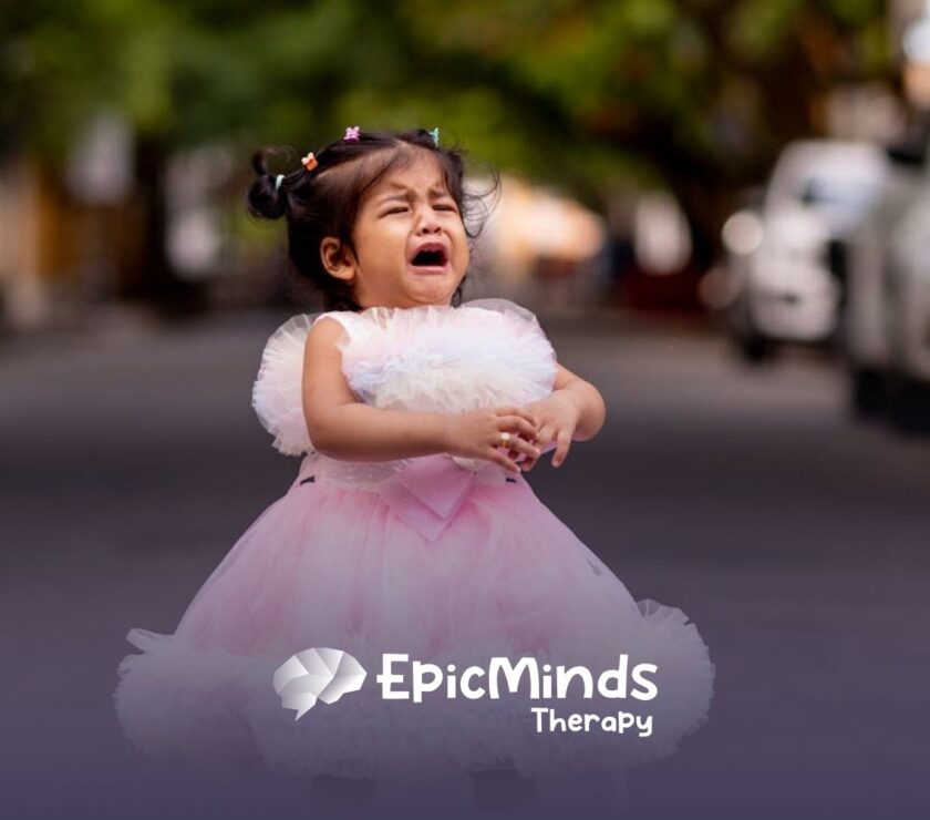 A little autistic girl in a pink frilly dress having a meltdown outdoors on a street in North Carolina.