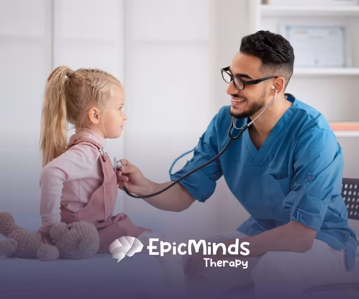 Doctor checking little girl’s chest with stethoscope.
