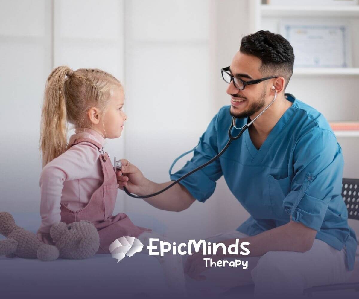 Doctor checking little girl’s chest with stethoscope.