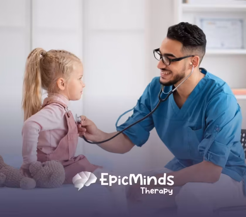 Doctor checking little girl’s chest with stethoscope.