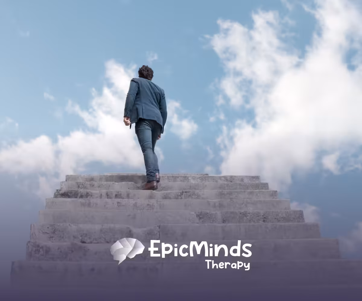 A back view of a man climbing stairs