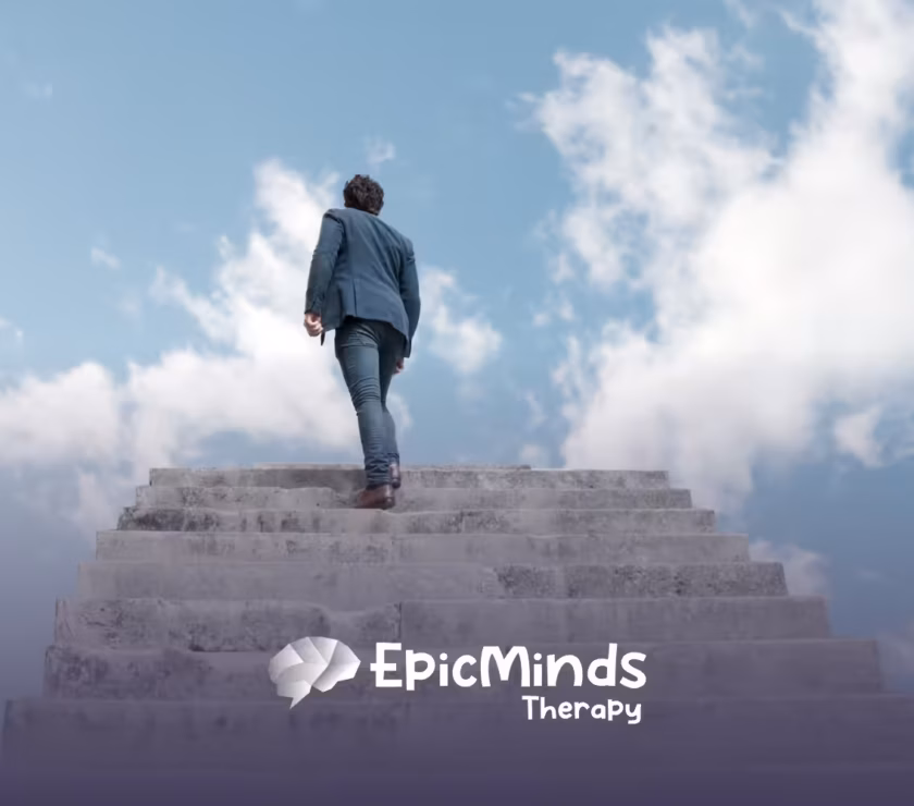 A back view of a man climbing stairs