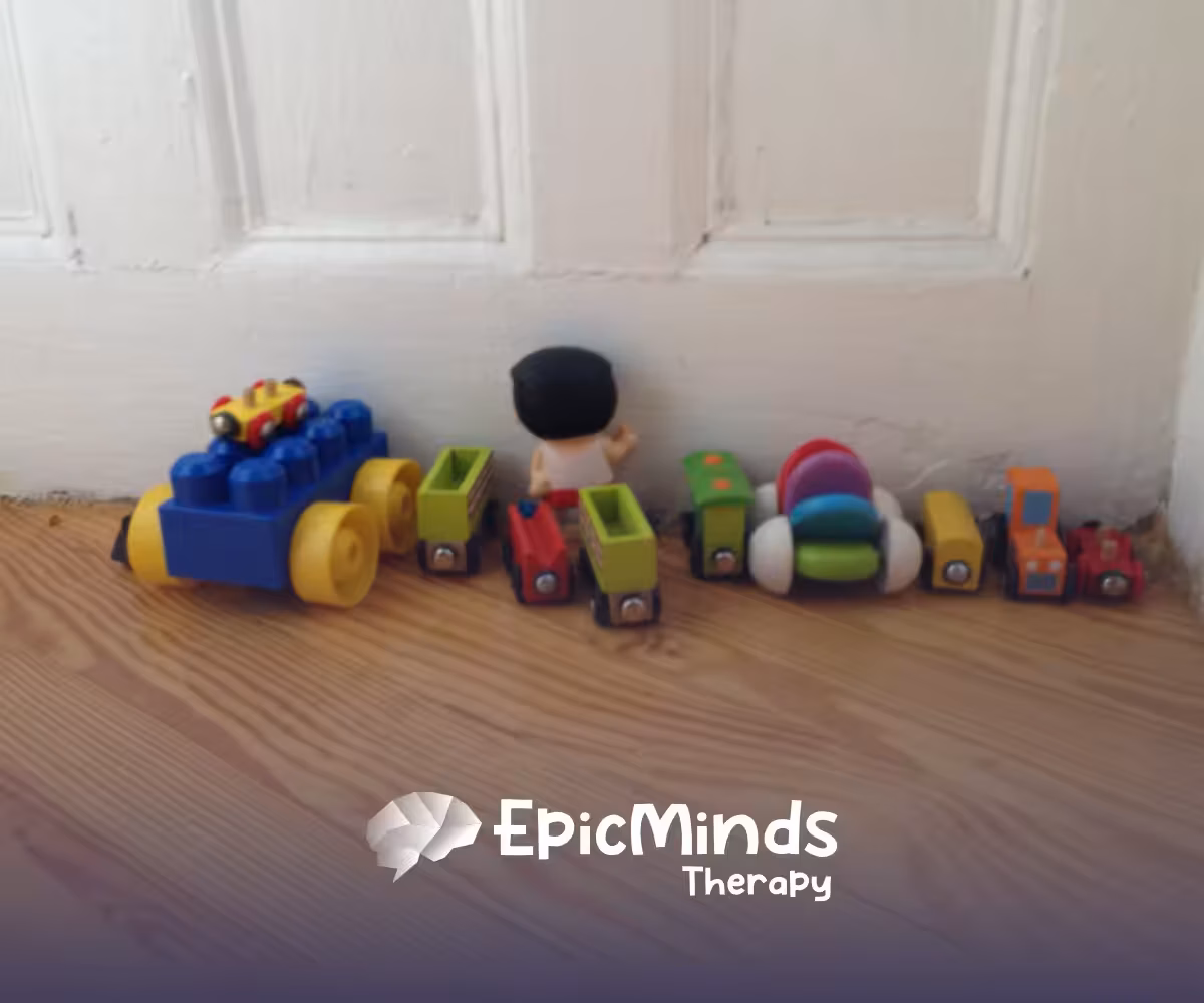 Toys lined up by a door