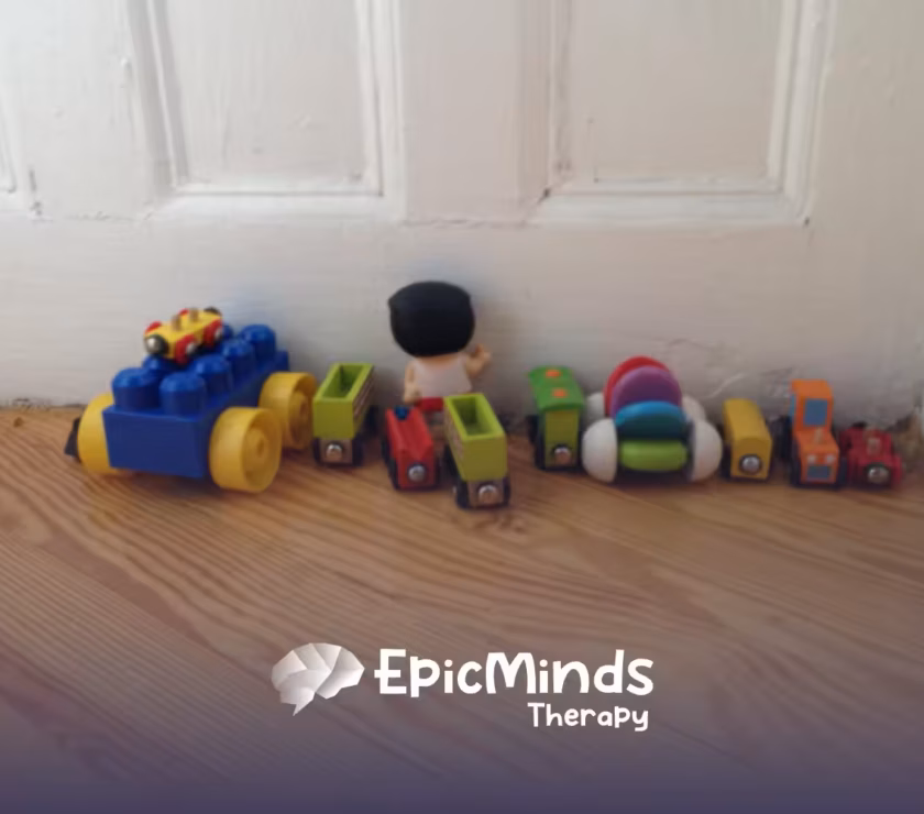 Toys lined up by a door